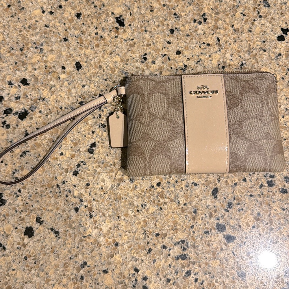 Tan Coach wristlet